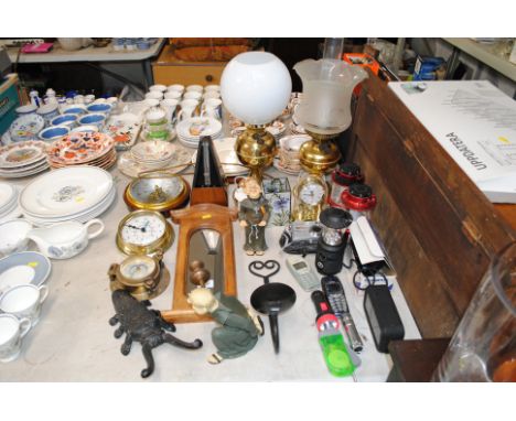 Two oil lamps converted to electricity; anniversary clock; Pentax camera; barometer; metronome etc.