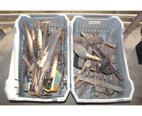 Two boxes containing various tools to include shears; hammers; chisels; small bench vice; screwdrivers etc.