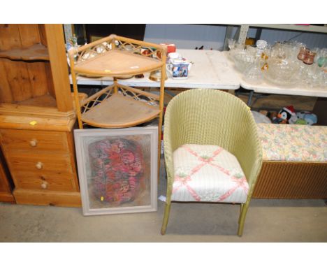 A wicker and cane corner shelf unit; a loom chair and a framed print 