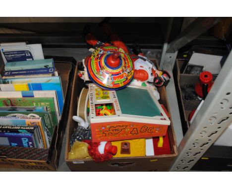 A box containing various children's toys to include a Chad Valley humming top etc