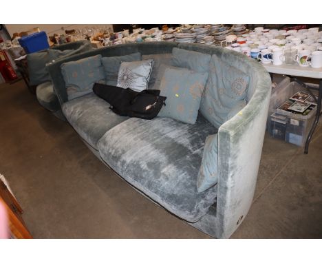 A Sforza blue upholstered three seater sofa