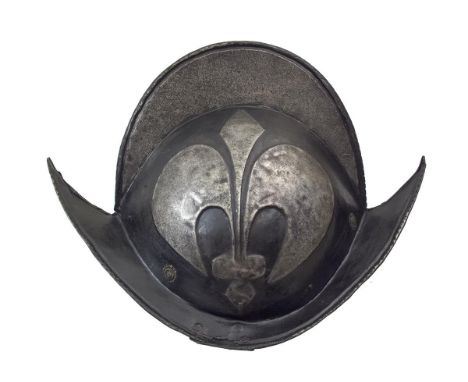 An early 17th Century German Black and White Comb Morion, two-piece skull of characteristic form with tall raised comb and do