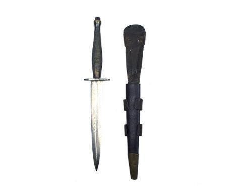 A Second Pattern Fairbairn-Sykes Fighting Knife, 17.5cm flattened diamond section blade etched with the Wilkinson Sword and F