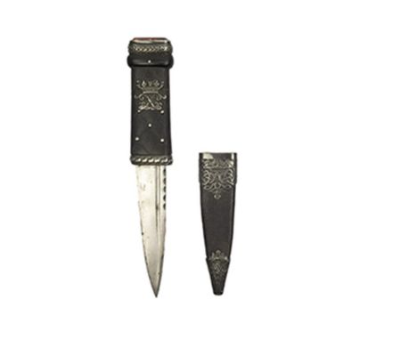 A white metal mounted sgian-dubh to the Argyle and Sutherland Highlanders, 10cm fullered blade with faceted back edge, charac