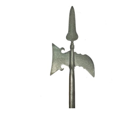 An 18th Century Sergeant's halberd, the head composed of shaped axe with opposing beak- form fluke, tapering leaf shaped term