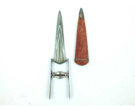 A mid to late 19th Century Indian Katar, 23.5cm blade with deeply chiselled fullers and broad armour piercing tip, characteri