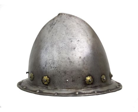 A 17th Century Italian Cabasset, characteristic almond-shaped skull with flattened stalk finial, shallow guttered brim with t