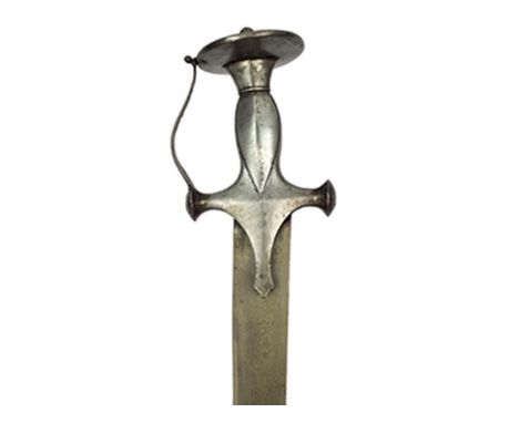 A 19th Century Tulwar, 72.5cm curved blade of wootz steel, characteristic hilt with scrolling knuckle guard and disc pommel, 