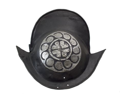 An early 17th Century North German Black and White Comb Morion, two-piece skull of characteristic form with tall raised comb 