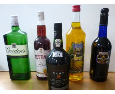 5 ASSORTED BOTTLES OF ALCOHOL INCLUDING GORDONS GIN, BANANA LIQUEUR, PORT ETC