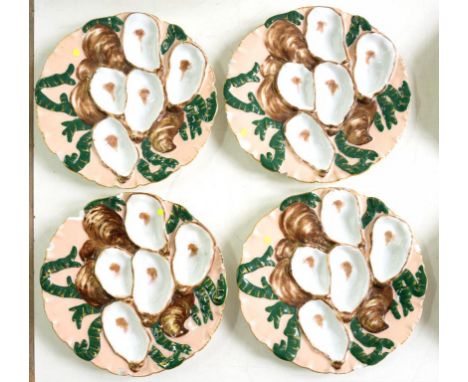 A SET OF FOUR LIMOGES OYSTER PLATES, 22CM DIAM, PRINTED MARKS, LATE 19TH C, CHIPPED, A SET OF FIVE FRENCH MAJOLICA ASPARAGUS 