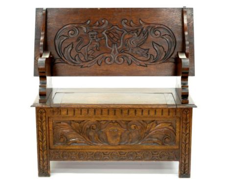A CARVED OAK MONKS BENCH, EARLY 20TH C, 78CM H; 107 X 48CM