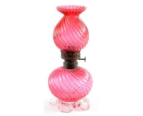 A VICTORIAN CRANBERRY GLASS OIL LAMP AND SHADE, OF UNUSUALLY SMALL SIZE AND GLOBULAR FORM, SPIRALLY REEDED ON CLEAR SHELL PIN