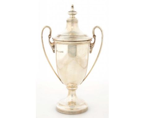 A GEORGE V TWO HANDLED SILVER TROPHY CUP AND COVER OF SHIELD SHAPE, 18CM H, BIRMINGHAM 1927, 5OZS 