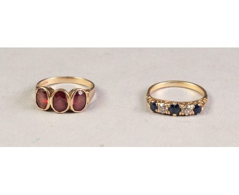 9ct GOLD RING COLLET SET WITH THREE OVAL GARNETS and a RING SET WITH TWO ROUND BRILLIANT CUT DIAMONDS and small oval sapphire