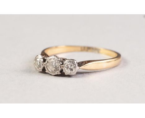 18ct GOLD RING, set with three small round brilliant cut diamonds, approx .30ct in total, 2.2gms, ring size 'M' 