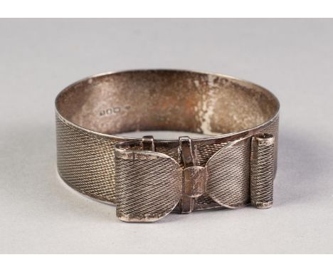 GEORGE VI ENGINE TURNED SILVER ADJUSTABLE BRACELET, with bow pattern clasp, London 1946, 1.2oz 