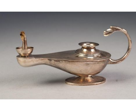 FOREIGN SILVER COLOURED METAL ROMAN OR GENIE LAMP PATTERN TABLE CIGARETTE LIGHTER, lacking wick cover and wand, 2 Â¾â€ (7cm) 