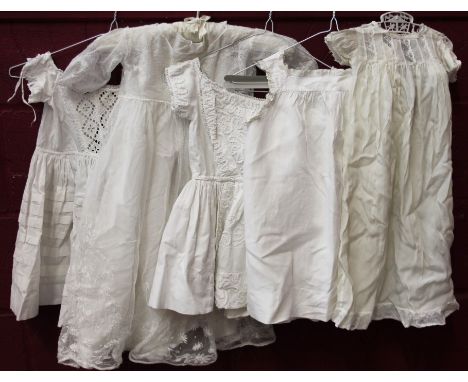 Vintage baby dresses, nightie, christening gown, lace embroidered net, etc, plus some white-worked linen with embroidery pull