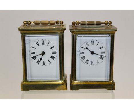 Early 20th century carriage clock with French eight day timepiece movement, lever escapement and white enamel dial, in a gilt