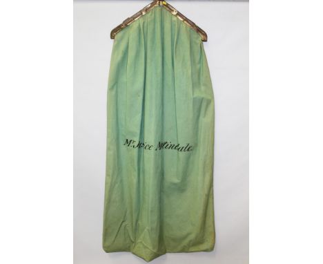 Vintage 'Jekmoth Home Store' garment-hanging bag / carrier with brass hinged mount and clips, green canvas with stencilled le
