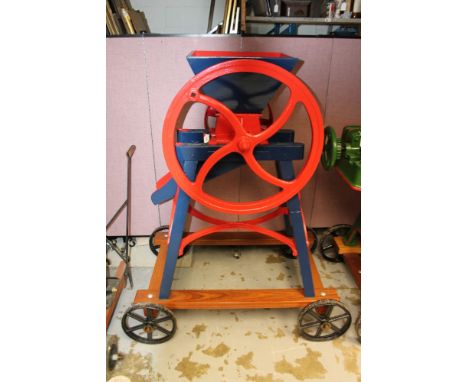 Ransomes & Simms Biddell's patent bean cutter - finely restored in blue and red livery, mounted on a hardwood four-wheeled ba
