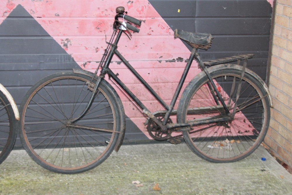 Triumph Palm Beach bicycle, together with Raleigh ladies' bicycle