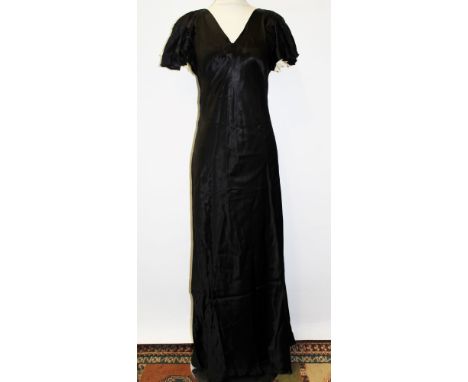 Ladies' 1930s black and cream silk evening dress, tiny covered button fastenings to back, split short sleeves, shaped bodice,