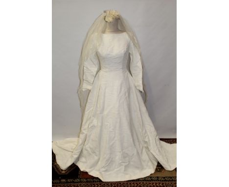 Vintage wedding dress in Liberty box circa 1950s / 1960s - boat neckline, fitted bodice, long sleeves, full-length with train