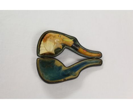 Good late 19th century meerschaum pipe carved in the form of an elephant's head, the amber and silver collar mouthpiece formi