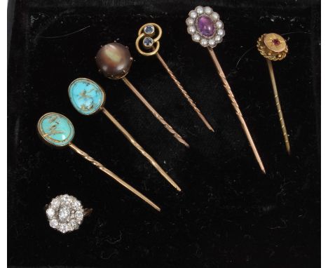 Group of six Victorian and later stick pins, together with a diamond cluster CONDITION REPORT The diamond nine stone cluster 