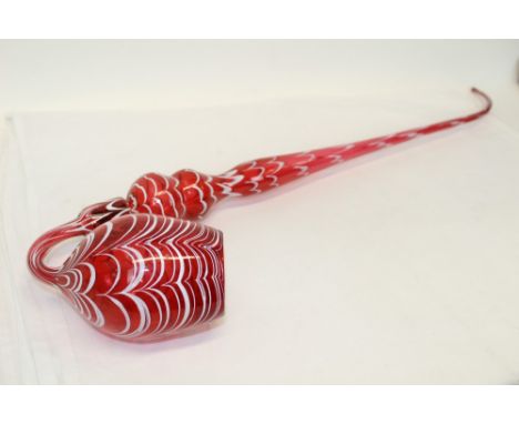 Massive 19th century Nailsea cranberry glass pipe with white drawn glass ornament, 99cm high