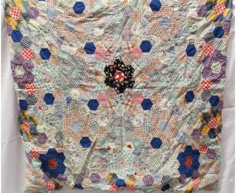 Vintage textile 1930s / 1940s double-sided patchwork cover - hand-stitched hexagons of printed cotton fabric, patchwork on bo