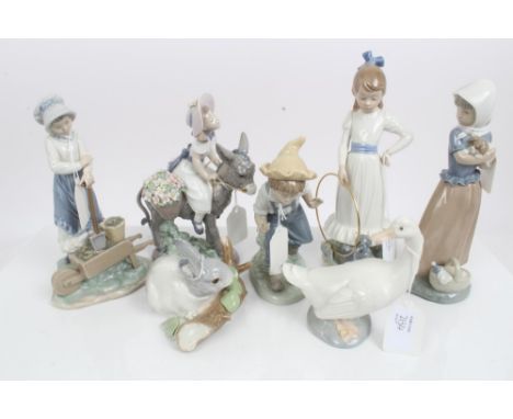 Lladro porcelain figure of a girl riding a donkey and a Lladro rabbit, plus four Nao figures and a Nao goose