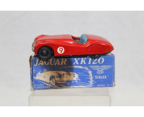 Tinplate keyless clockwork Jaguar XK120 'Scalex' scale 33-1, Mini Models Ltd., colour red, in original box