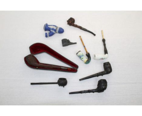 Early 20th century well-carved novelty briar pipe carved as a gentleman, 14cm high, together with carved St. Cloud-style bria