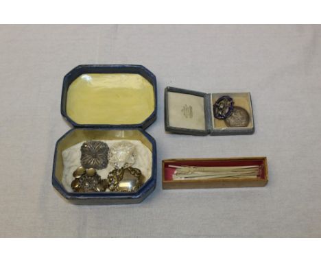 A decorative Indian lacquered box containing three white metal brooches and one other mother of pearl, a Victorian Silver Jub