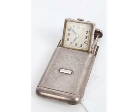 Art Deco travelling clock in rectangular silver case