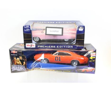 Diecast boxed selection of larger scale models, sports and performance cars - including Maisto, etc (8)