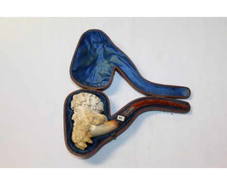 Large 19th century meerschaum pipe carved in the form of the head of Bacchus with grapevine headdress, silver collar and ambe