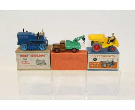 Dinky Breakdown Lorry no. 25X, Dumper Truck no. 562, Heavy Tractor no. 563 - all boxed (3)