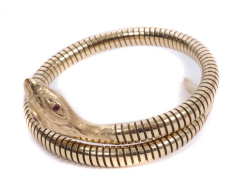 Gold (9ct) snake bangle with ruby eyes CONDITION REPORT Bangle contains steel spring.  Total gross weight approximately 25.5 