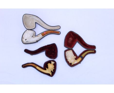Carved meerschaum pipe modelled as a Turkish soldier, in bearskin hat, sterling silver collar and amber mouthpiece, 13cm long