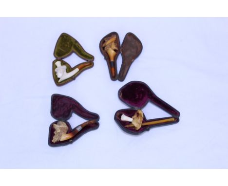Highly unusual carved meerschaum cheroot holder carved as a bat, speared by the amber mouthpiece, 12cm long, together with a 