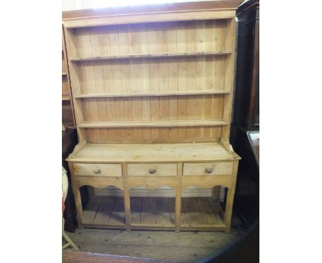 A Victorian Pine sideboard with shelf back, three drawers and pot cupboard