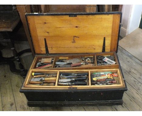 A Victorian Pine tool box containing a wide range of carpentry tools including chisels, gauges and plates etc