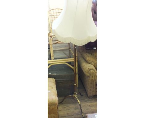A Brass adjustable standard lamp