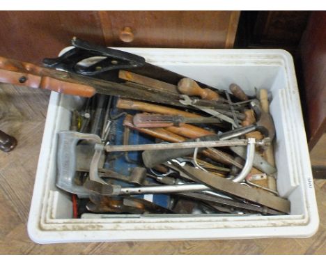 A large tub containing various woodworking and other tools