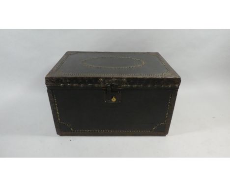A 19th Century Leather Covered Carriage Trunk. The Interior Bears the Paper Label for 'J. Lovell's Trunk Manufactory, Northam