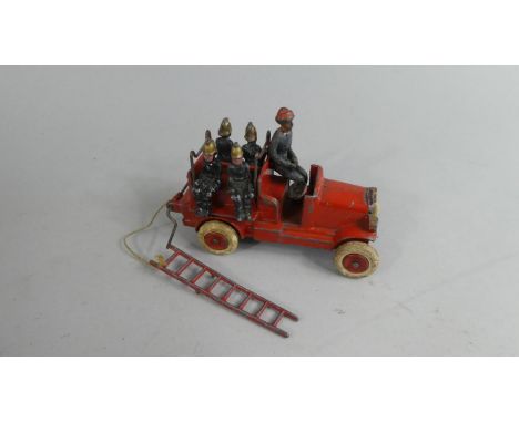 A Early/Mid 20th Century Die Cast Toy Model of a Fire Engine, With Four Side Seated&nbsp; Firemen and a Driver, Complete with
